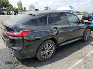 2020 BMW X4 xDrive30i z VIN 5UX2V1C0XL9B93562, wystawiony jako Copart lot #56180595 z przebiegiem 71 667 mil mil oraz Szkoda całkowita • Salvage title. Historia ofert i sprzedaży dostępna na DreamBid. Obrazek 3.
