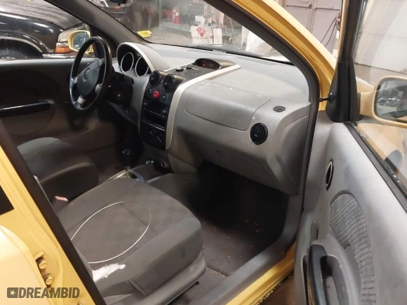 2005 Chevrolet Aveo LS with VIN KL1TD62655B310654, listed as a IAAI auction lot 41389685 with 107,879 mi miles. Bid and sale history available at carsss.com. Image 5.
