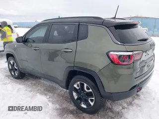 2018 Jeep Compass Trailhawk with VIN 3C4NJDDB5JT190890, listed as a IAAI auction lot 41251405 with 35,320 mi miles and . Bid and sale history available at carsss.com. Image 3.
