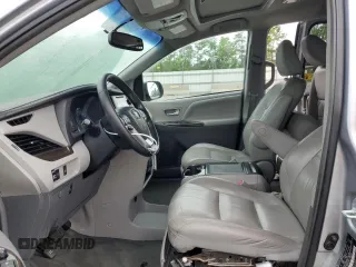 2015 Toyota Sienna XLE с VIN 5TDYK3DC7FS571431, выставлен на аукционе Copart как лот 57173595 с пробегом 305 940 миль миль и Списание • Salvage title. История ставок и продаж доступна на DreamBid. Изображение 7.