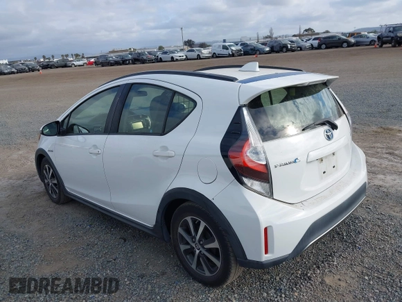 2018 Toyota Prius One with VIN JTDKDTB39J1599675, listed as a IAAI auction lot 42041921 with 64,586 mi miles and . Bid and sale history available at DreamBid. Image 3.