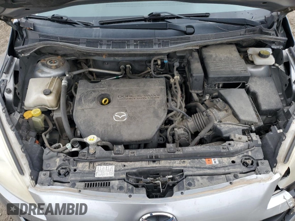 2012 Mazda 5 Grand Touring z VIN JM1CW2DL1C0142406, wystawiony jako Copart lot #48186495 z przebiegiem 198 419 mil mil oraz Nie do naprawy • Non repairable. Historia ofert i sprzedaży dostępna na DreamBid. Obrazek 11.