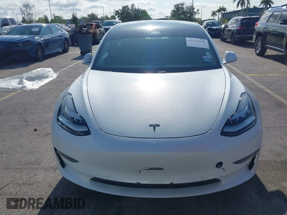 2020 Tesla Model 3 Standard Range Plus with VIN 5YJ3E1EA6LF799620, listed as a IAAI auction lot 42221643 with 55,458 mi miles and . Bid and sale history available at carsss.com. Image 11.