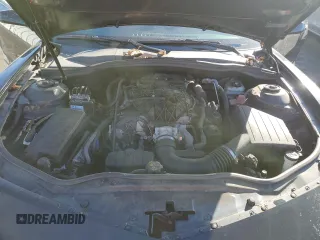 2013 Chevrolet Camaro LS z VIN 2G1FA1E31D9159064, wystawiony jako Copart lot #83698194 z przebiegiem 131 642 mil mil oraz Szkoda całkowita • Salvage title. Historia ofert i sprzedaży dostępna na DreamBid. Obrazek 11.