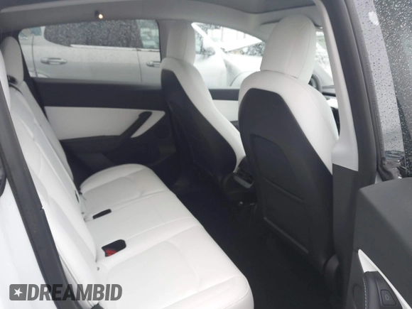2021 Tesla Model Y Performance with VIN 5YJYGDEF2MF230374, listed as a IAAI auction lot 41708828 with 20,272 mi miles. Bid and sale history available at carsss.com. Image 8.