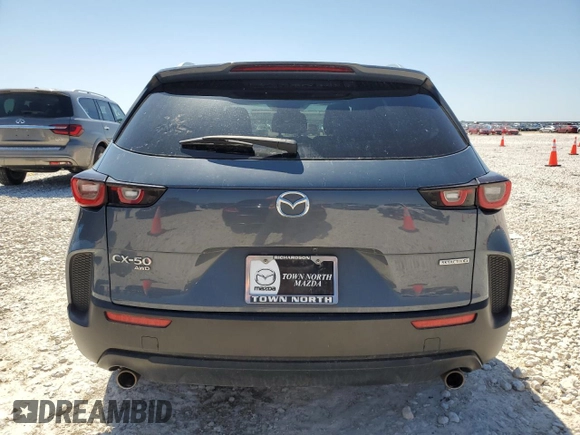 2023 Mazda CX-50 S Preferred Plus с VIN 7MMVABCM5PN110083, выставлен на аукционе Copart как лот 52046055 с пробегом 34 838 миль миль и Списание • Salvage title. История ставок и продаж доступна на DreamBid. Изображение 6.