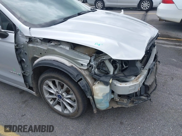 2017 Ford Fusion Hybrid SE with VIN 3FA6P0LU2HR317784, listed as a IAAI auction lot 42618554 with 114,814 mi miles and . Bid and sale history available at DreamBid. Image 18.