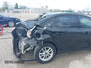 2015 Ford Focus SE with VIN 1FADP3F2XFL313187, listed as a IAAI auction lot 42083426 with 96,562 mi miles and . Bid and sale history available at carsss.com. Image 18.