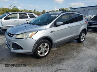 2013 Ford Escape SE with VIN 1FMCU9GX0DUC37218, listed as a Copart auction lot 53992485 with 188,571 mi miles and Salvage Title. Bid and sale history available at DreamBid. Image 1.