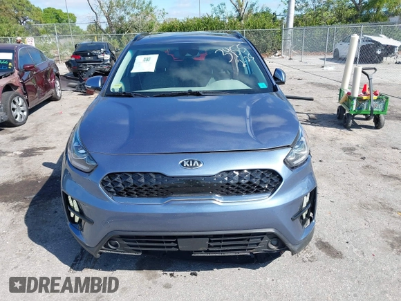 2021 Kia Niro Touring with VIN KNDCC3LC3M5483455, listed as a IAAI auction lot 41678795 with 132,216 mi miles. Bid and sale history available at carsss.com. Image 12.