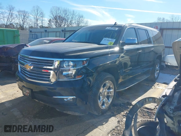 2015 Chevrolet Suburban LTZ with VIN 1GNSCKKC3FR249956, listed as a IAAI auction lot 41306605 with 122,942 mi miles and . Bid and sale history available at DreamBid. Image 17.