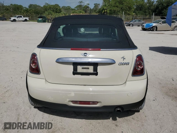 2014 MINI Convertible с VIN WMWZN3C56ET569651, выставлен на аукционе Copart как лот 66455675 с пробегом 117 994 миль миль и Списание • Salvage title. История ставок и продаж доступна на DreamBid. Изображение 6.