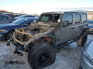 2018 Jeep Wrangler Unlimited Sport S z VIN 1C4HJXDG1JW323469, wystawiony jako Copart lot #88889645 z przebiegiem Nie podano mil oraz Szkody całkowita. Historia ofert i sprzedaży dostępna na DreamBid. Obrazek 1.