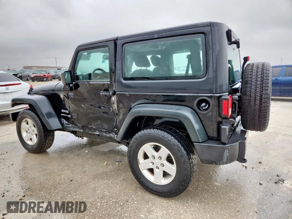 2014 Jeep Wrangler Sport with VIN 1C4AJWAG9EL261147, listed as a Copart auction lot 59417335 with 133,835 mi miles and Salvage title. Bid and sale history available at DreamBid. Image 2.