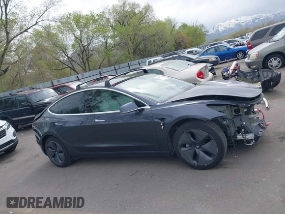 2020 Tesla Model 3 Long Range with VIN 5YJ3E1EB1LF639055, listed as a IAAI auction lot 42048009 with 43,493 mi miles. Bid and sale history available at carsss.com. Image 13.