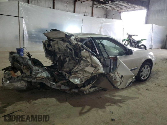 2002 Mazda Protege DX with VIN JM1BJ225021583998, listed as a Copart auction lot 49874135 with Not Provided miles and Non Repairable. Bid and sale history available at DreamBid. Image 3.