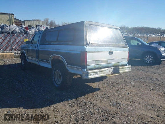 1986 Ford F-150 with VIN 1FTEF14N0GPA37633, listed as a IAAI auction lot 42084341 with 230,894 mi miles. Bid and sale history available at carsss.com. Image 3.