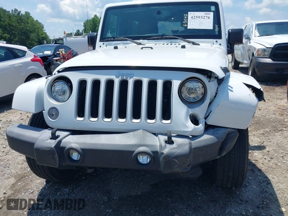 2018 Jeep Wrangler Unlimited Sahara with VIN 1C4BJWEG3JL805263, listed as a IAAI auction lot 42593276 with 96,489 mi miles and . Bid and sale history available at DreamBid. Image 6.