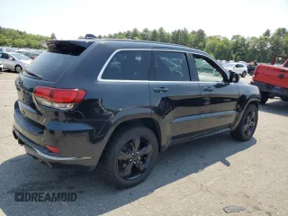 2016 Jeep Grand Cherokee Overland z VIN 1C4RJFCG5GC343864, wystawiony jako Copart lot #60892615 z przebiegiem 97 133 mil mil oraz Szkoda całkowita • Salvage title. Historia ofert i sprzedaży dostępna na DreamBid. Obrazek 3.