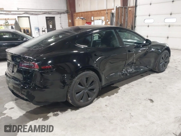 2022 Tesla Model S with VIN 5YJSA1E58NF478403, listed as a IAAI auction lot 41533099 with 42,779 mi miles and . Bid and sale history available at DreamBid. Image 4.