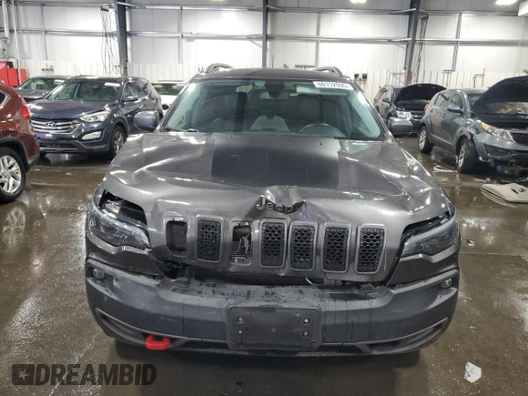 2020 Jeep Cherokee Trailhawk with VIN 1C4PJMBX9LD582951, listed as a Copart auction lot 60152935 with 61,448 mi miles and Salvage title. Bid and sale history available at DreamBid. Image 5.