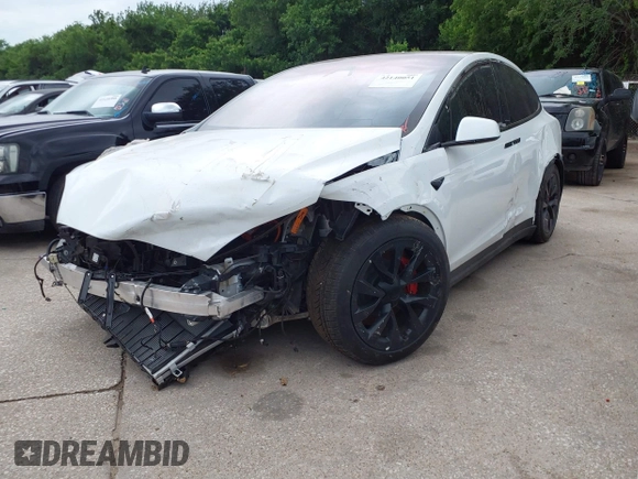 2024 Tesla Model X Plaid with VIN 7SAXCBE63RF440245, listed as a IAAI auction lot 42140051 with Not Provided miles and . Bid and sale history available at DreamBid. Image 2.