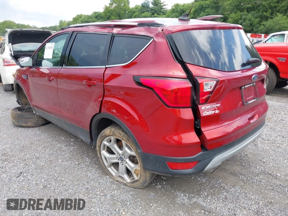 2019 Ford Escape Titanium with VIN 1FMCU9J97KUC08287, listed as a IAAI auction lot 42702548 with 45,207 mi miles and . Bid and sale history available at DreamBid. Image 3.