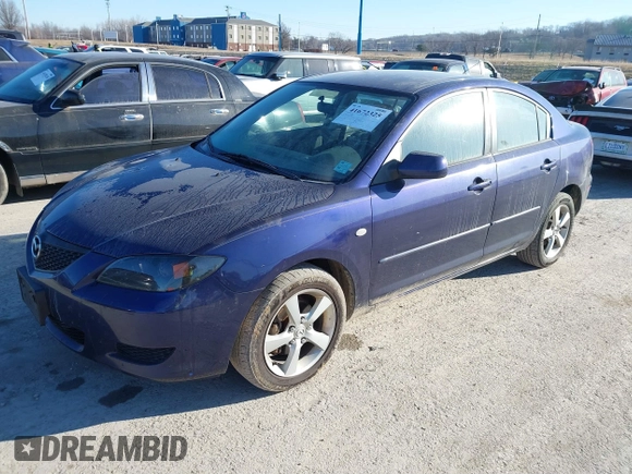 2006 Mazda 3 i with VIN JM1BK12F861468765, listed as a IAAI auction lot 41672325 with 247,918 mi miles. Bid and sale history available at carsss.com. Image 2.