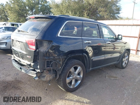 2013 Jeep Grand Cherokee Overland with VIN 1C4RJECT2DC546634, listed as a IAAI auction lot 41180807 with 111,897 mi miles. Bid and sale history available at carsss.com. Image 4.
