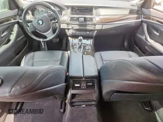 2016 BMW 5 Series 528i with VIN WBA5A5C59GD528109, listed as a Copart auction lot 61691405 with 107,837 mi miles and Salvage title. Bid and sale history available at DreamBid. Image 8.