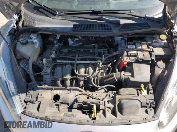 2019 Ford Fiesta SE z VIN 3FADP4BJXKM123806, wystawiony jako Copart lot #53184825 z przebiegiem 141 759 mil mil oraz Szkoda całkowita • Salvage title. Historia ofert i sprzedaży dostępna na DreamBid. Obrazek 13.
