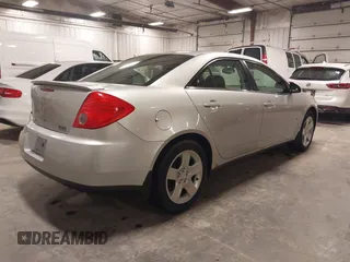 2009 Pontiac G6 w/1SA *Ltd Avail* with VIN 1G2ZG57B094155004, listed as a IAAI auction lot 41925584 with 123,169 mi miles. Bid and sale history available at carsss.com. Image 4.