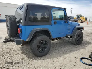 2002 Jeep Wrangler Sport with VIN 1J4FA49S32P762794, listed as a Copart auction lot 52132955 with 243,499 mi miles and Salvage Title. Bid and sale history available at carsss.com. Image 3.