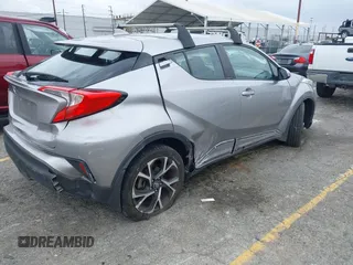 2018 Toyota C-HR XLE with VIN NMTKHMBX8JR032422, listed as a IAAI auction lot 42038240 with 132,553 mi miles and . Bid and sale history available at DreamBid. Image 4.