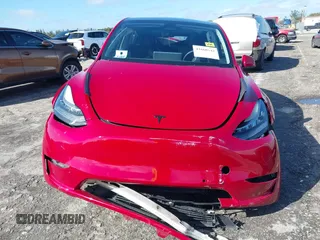 2022 Tesla Model Y Long Range z VIN 7SAYGDEE1NF385414, wystawiony jako IAAI lot #41660542 z przebiegiem 54 075 mil mil oraz . Historia ofert i sprzedaży dostępna na DreamBid. Obrazek 6.