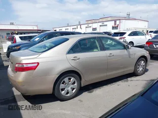 2007 Toyota Camry CE with VIN 4T1BE46KX7U716414, listed as a IAAI auction lot 42116250 with 104,298 mi miles and . Bid and sale history available at DreamBid. Image 13.