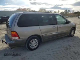 2002 Ford Windstar LTD with VIN 2FMDA58402BB70357, listed as a Copart auction lot 82145564 with 163,065 mi miles and Salvage Title. Bid and sale history available at carsss.com. Image 3.