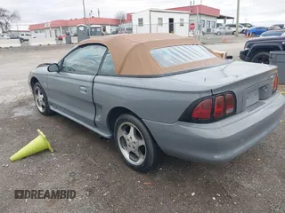 1998 Ford Mustang GT with VIN 1FAFP45X4WF192828, listed as a IAAI auction lot 41213080 with 173,010 mi miles. Bid and sale history available at carsss.com. Image 3.