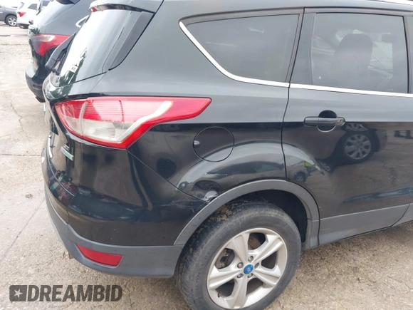 2013 Ford Escape SE with VIN 1FMCU0GX5DUB68604, listed as a IAAI auction lot 42126594 with 165,540 mi miles and . Bid and sale history available at carsss.com. Image 6.