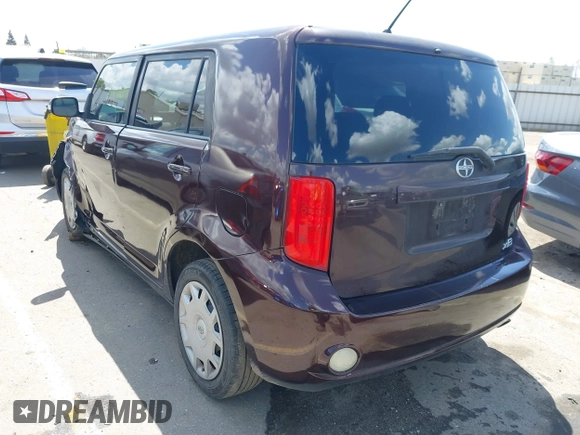 2008 Scion xB with VIN JTLKE50E281001793, listed as a IAAI auction lot 41947484 with 141,423 mi miles. Bid and sale history available at carsss.com. Image 3.
