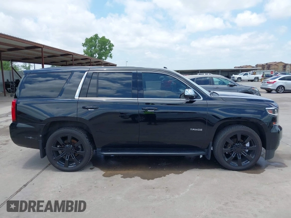 2015 Chevrolet Tahoe with VIN 1GNSK2KC4FR610534, listed as a IAAI auction lot 42357319 with 140,479 mi miles and . Bid and sale history available at DreamBid. Image 13.