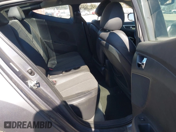 2013 Hyundai Veloster w/Black Int with VIN KMHTC6AD5DU095867, listed as a IAAI auction lot 42698380 with 115,528 mi miles and . Bid and sale history available at DreamBid. Image 8.