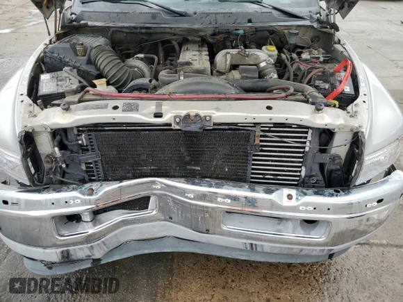 1999 Dodge 2500 z VIN 1B7KF2361XJ509781, wystawiony jako Copart lot #57282495 z przebiegiem 135 666 mil mil oraz Szkoda całkowita • Salvage title. Historia ofert i sprzedaży dostępna na DreamBid. Obrazek 11.