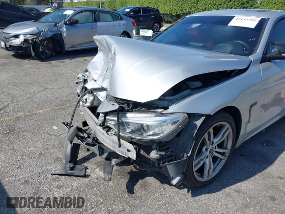 2014 BMW 4 Series 428i xDrive with VIN WBA3N9C54EF721188, listed as a IAAI auction lot 42143305 with Not provided miles and . Bid and sale history available at DreamBid. Image 16.