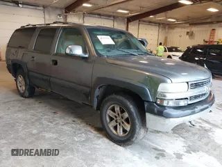 2000 Chevrolet Suburban LT z VIN 3GNFK16TXYG151521, wystawiony jako IAAI lot #42535297 z przebiegiem 327 140 mil mil oraz . Historia ofert i sprzedaży dostępna na DreamBid. Obrazek 1.