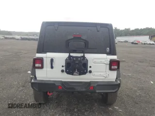 2021 Jeep Wrangler Unlimited Rubicon с VIN 1C4HJXFN1MW796739, выставлен на аукционе IAAI как лот 42540683 с пробегом 56 864 миль миль и . История ставок и продаж доступна на DreamBid. Изображение 16.