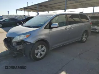 2012 Toyota Sienna LE AAS with VIN 5TDKK3DC8CS259085, listed as a Copart auction lot 73592584 with 198,370 mi miles and Salvage Title. Bid and sale history available at DreamBid. Image 1.