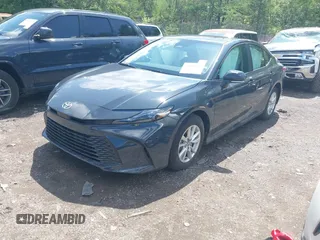 2025 Toyota Camry LE with VIN 4T1DAACK6SU584011, listed as a IAAI auction lot 42119086 with 7,229 mi miles and . Bid and sale history available at DreamBid. Image 2.