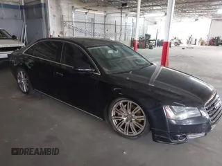 2013 Audi A8 L 3.0L with VIN WAURGAFD4DN013519, listed as a IAAI auction lot 41627668 with 222,737 mi miles. Bid and sale history available at carsss.com. Image 1.