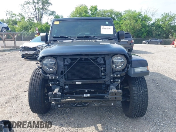 2020 Jeep Wrangler Unlimited Sahara High Altitude with VIN 1C4HJXEGXLW182581, listed as a IAAI auction lot 42612084 with 52,656 mi miles and . Bid and sale history available at DreamBid. Image 13.